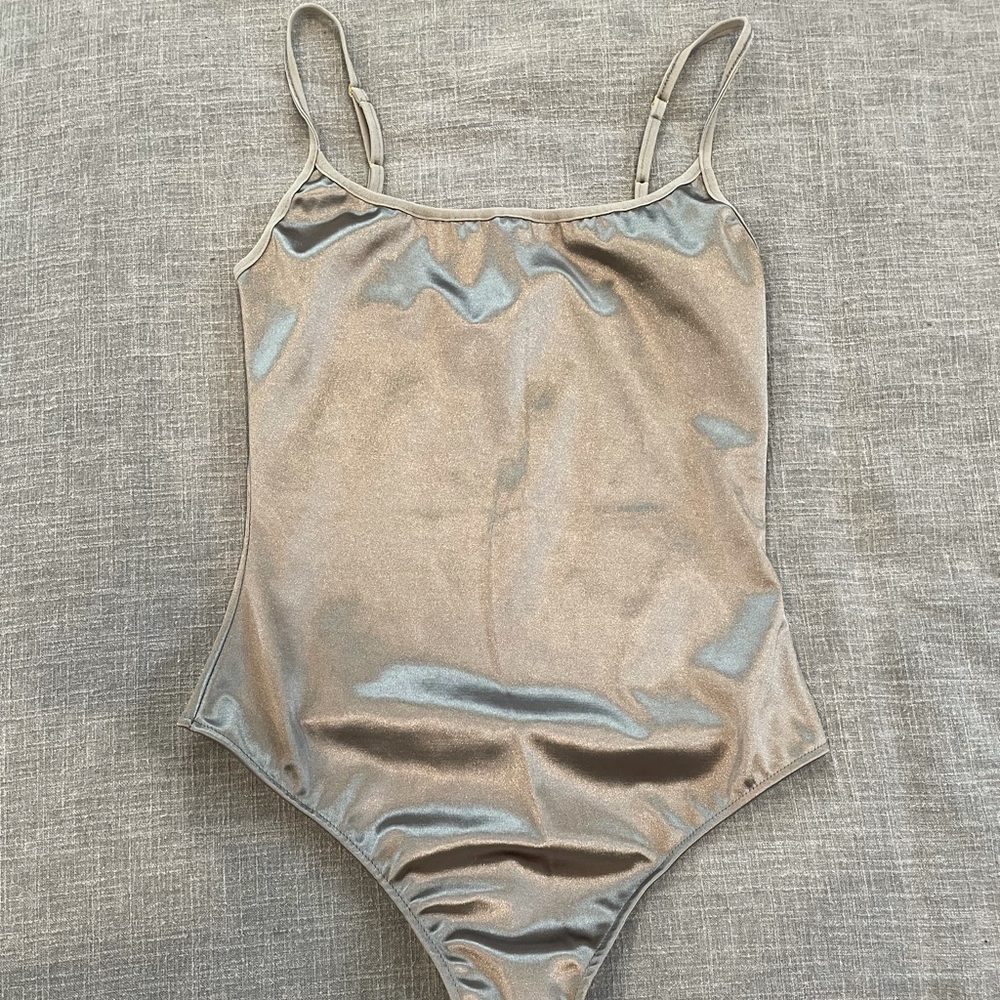 FreePeople brand new silver satin thong body suit